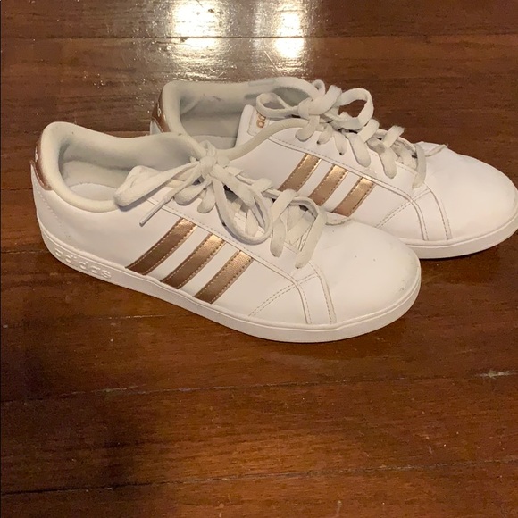 gold and white adidas shoes